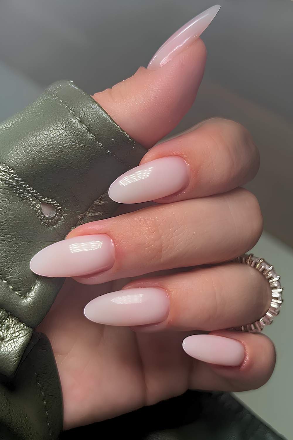 Almond-shaped sheer milky white mani