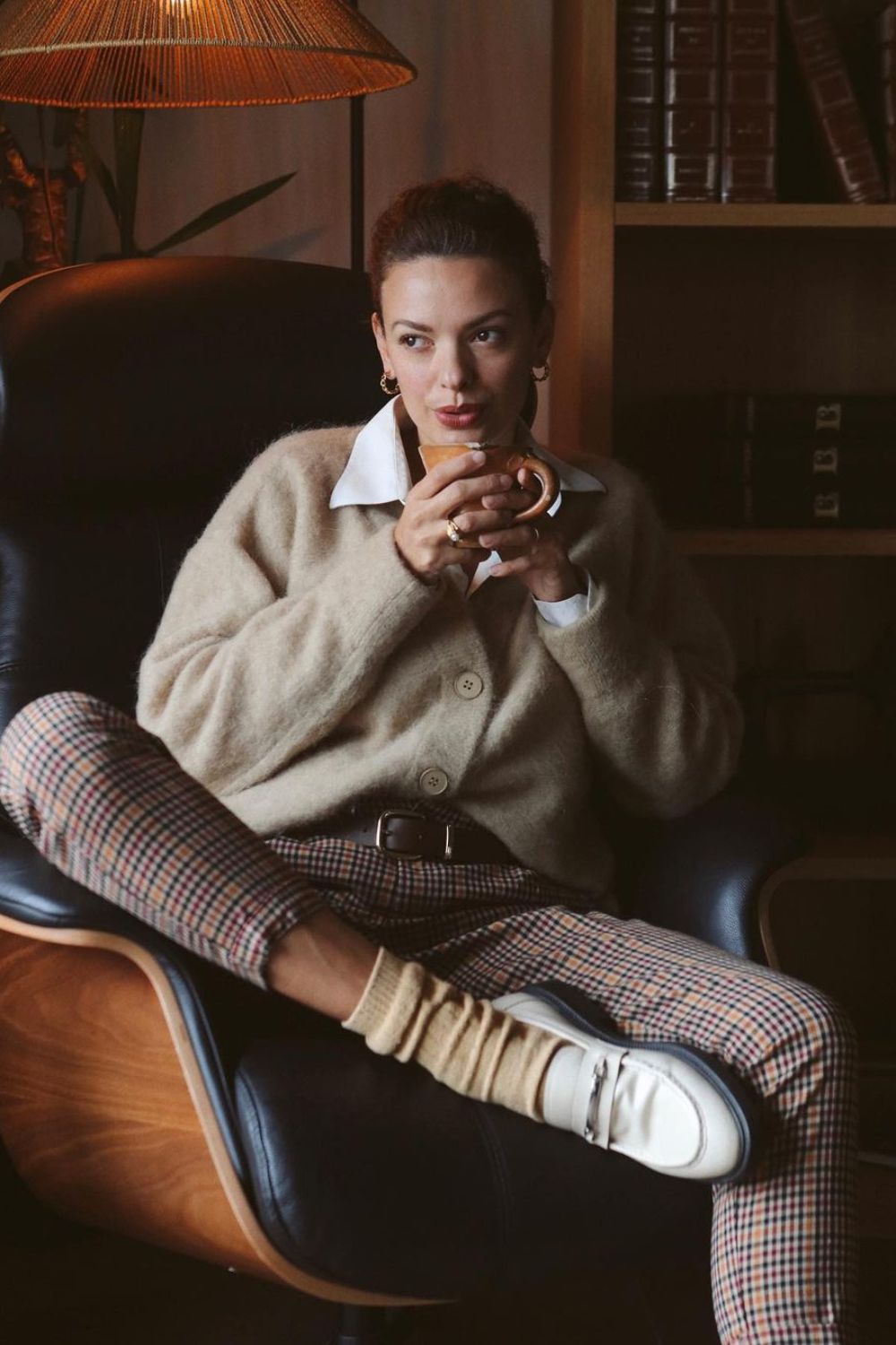 Beige cardigan with plaid trousers and loafers