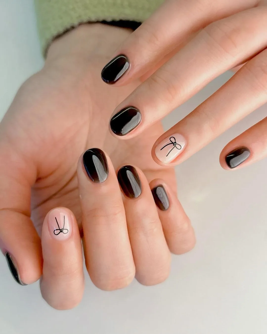 Black Korean nails with bows