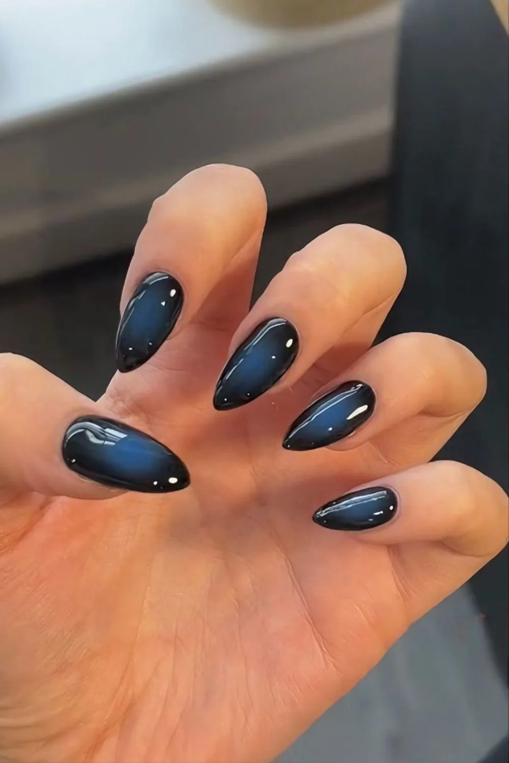 Black and navy blue aura nails