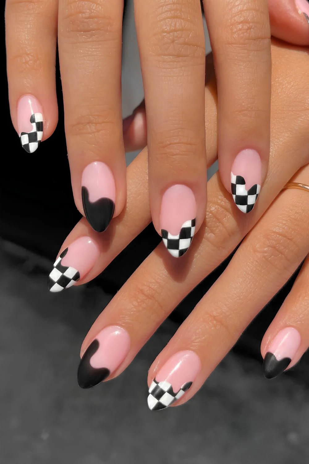 Black and white checkerboard accent nails
