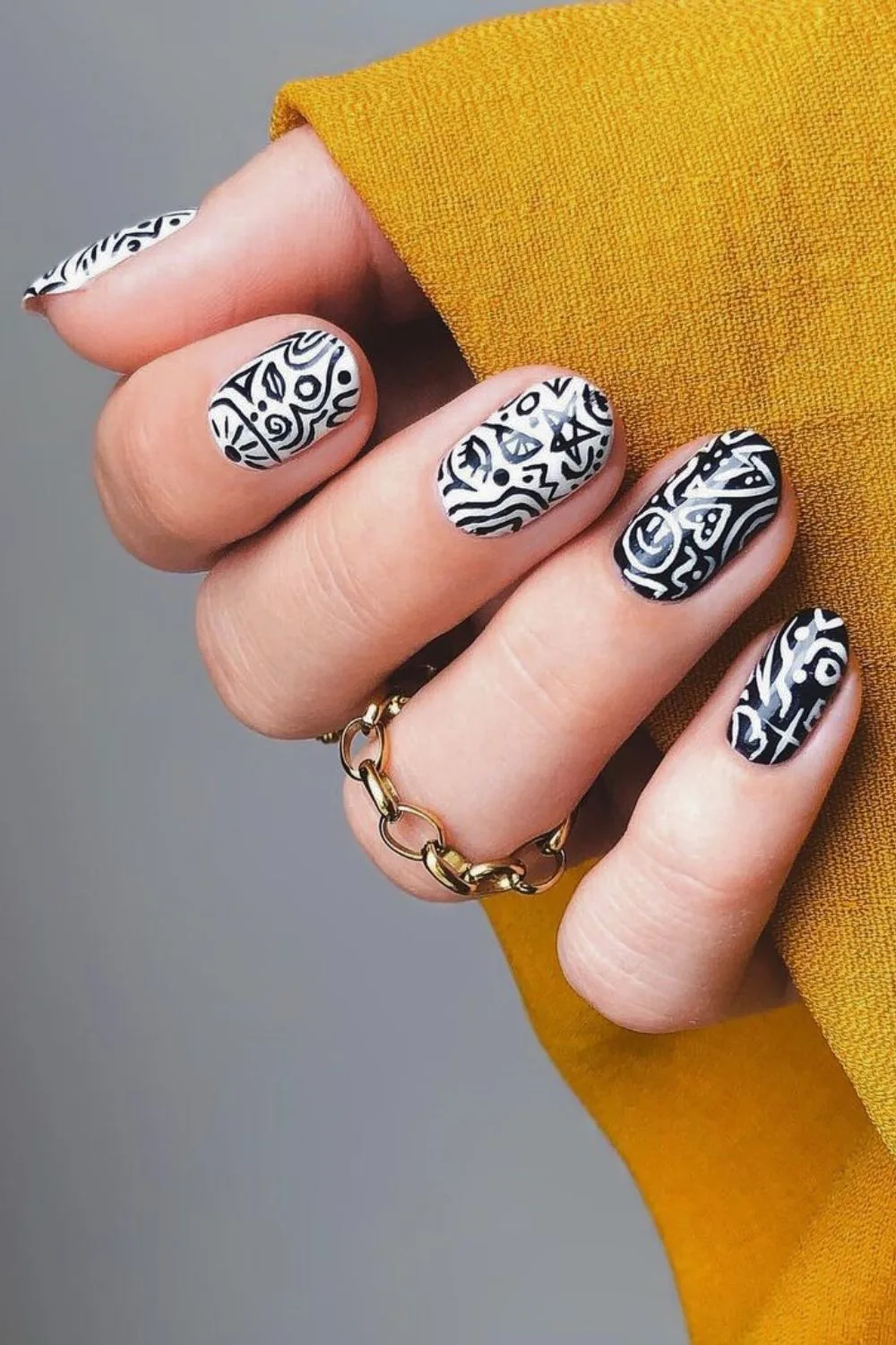 Black and white nails with doodles