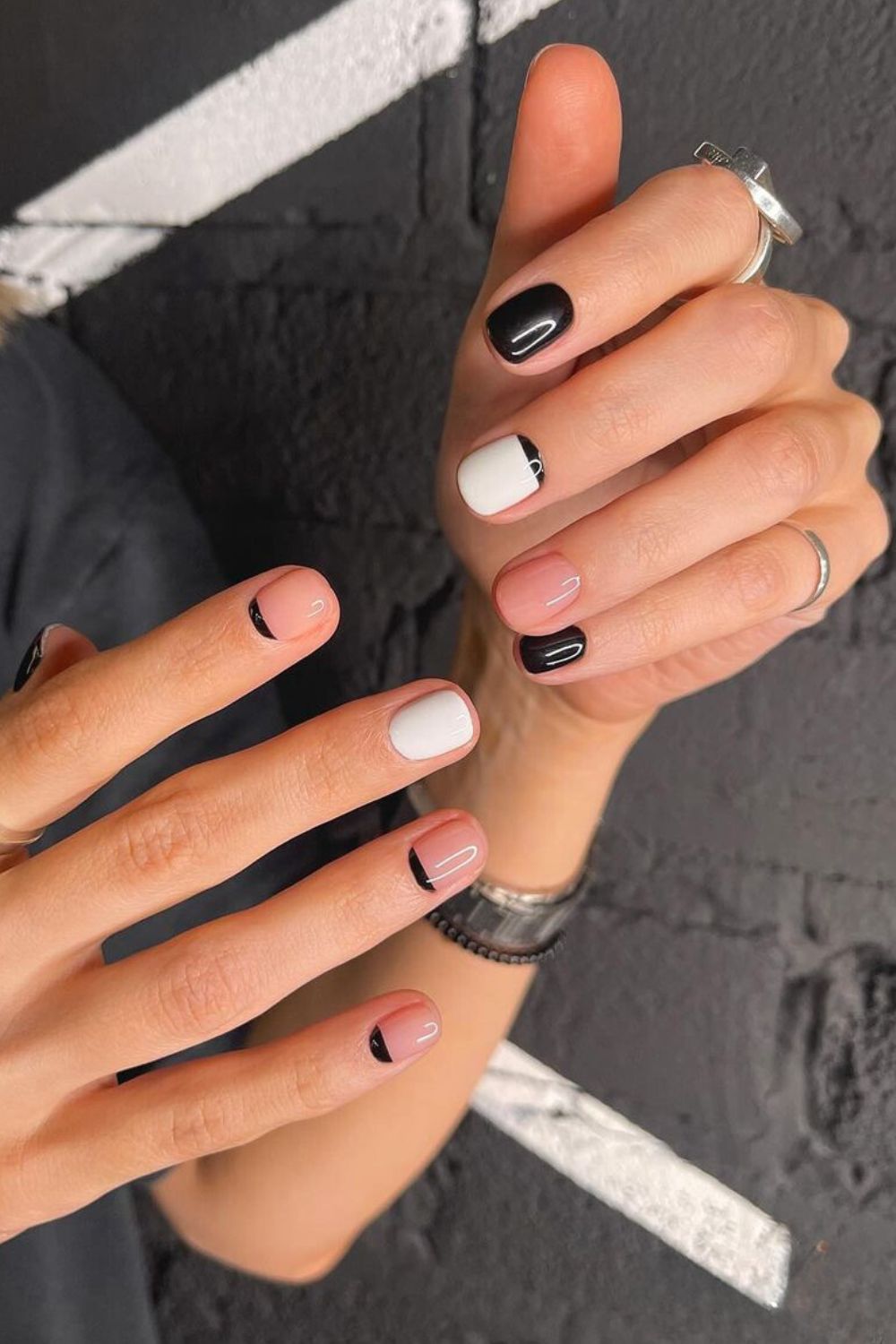 Black and white nails with half moon accents