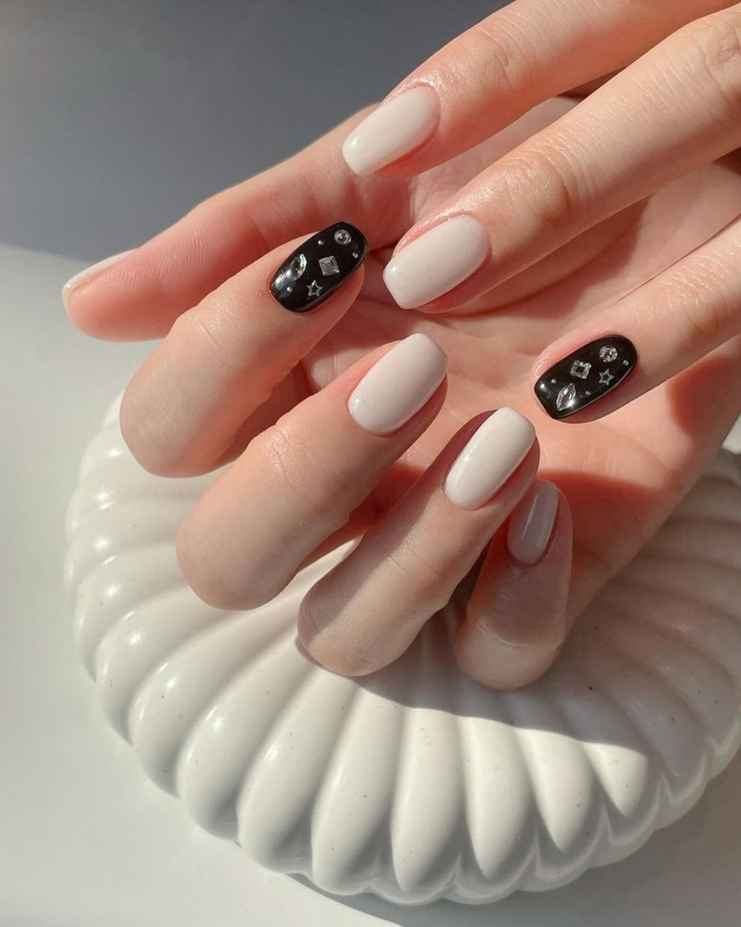 Black and white nails with rhinestones