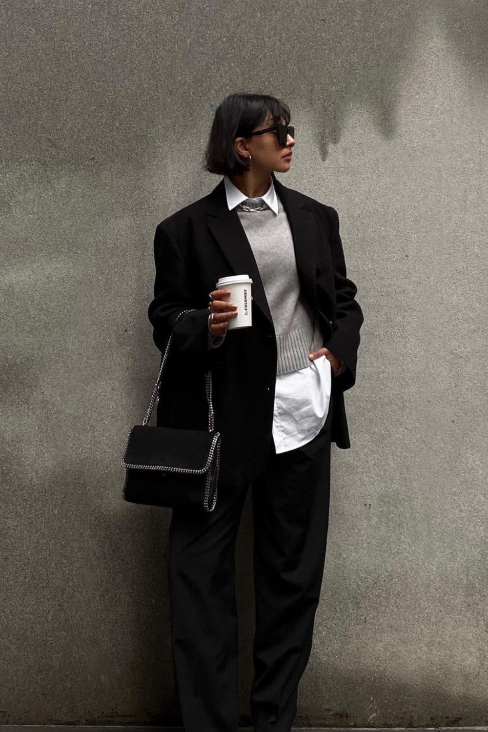 Black blazer with grey sweater and white shirt