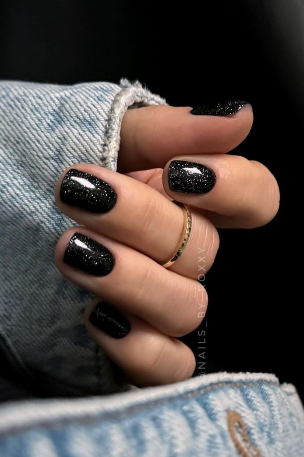 Black nails with subtle glitter