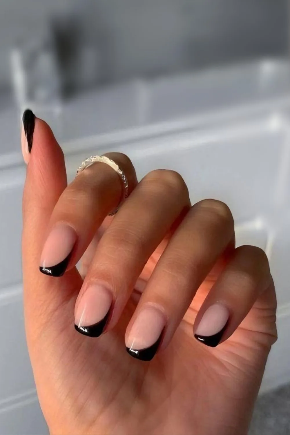 Black side French tip manicure