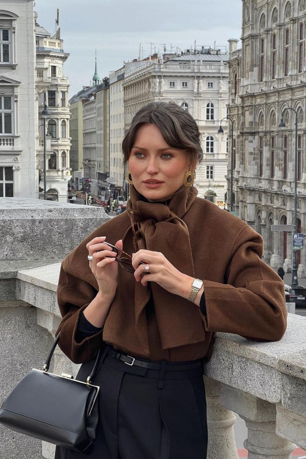 Bow-Tied Brown Coat with Black Trousers