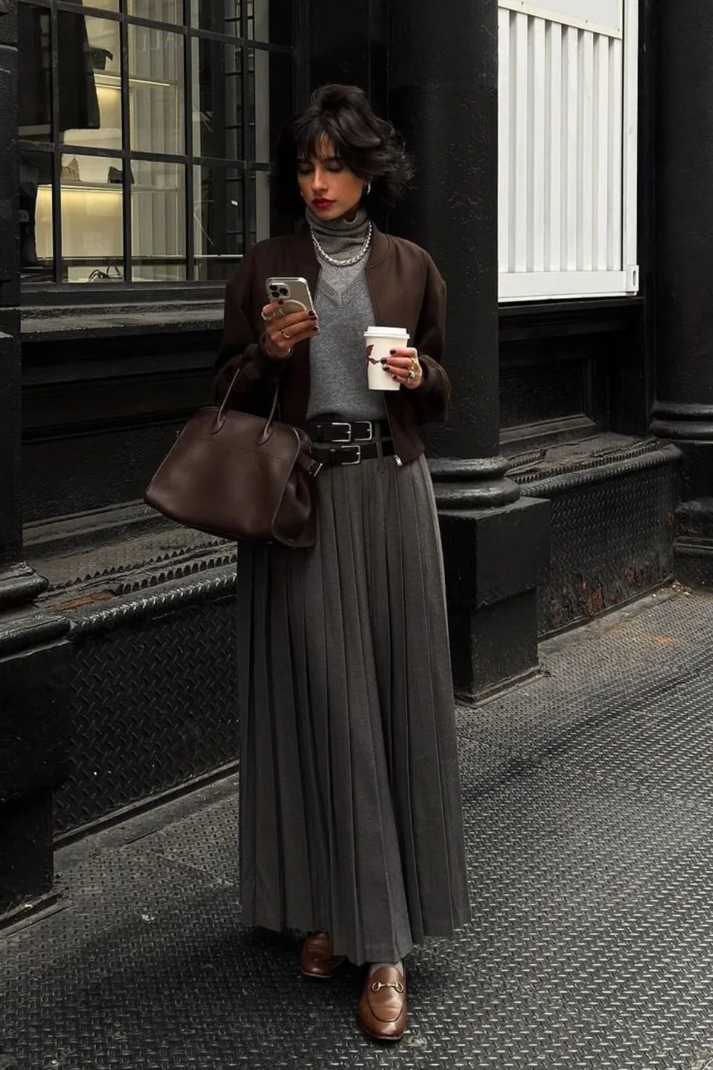 Brown jacket with pleated skirt and turtleneck