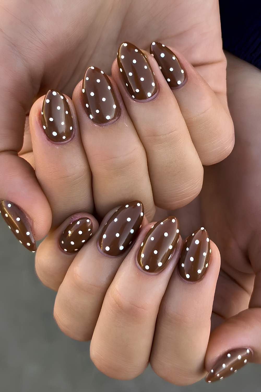 Brown mani with white polka dots