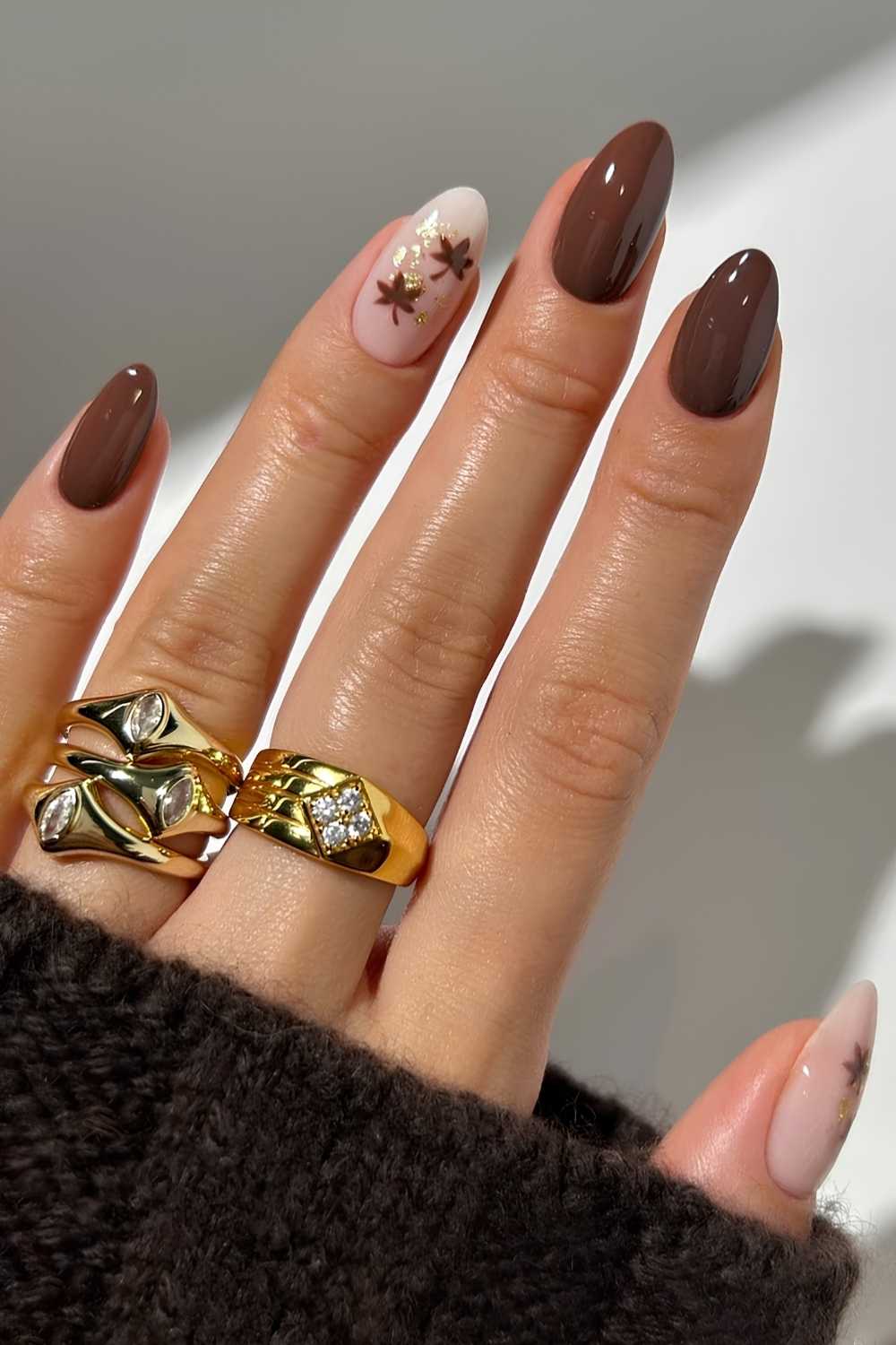Brown nails with fall leaf art