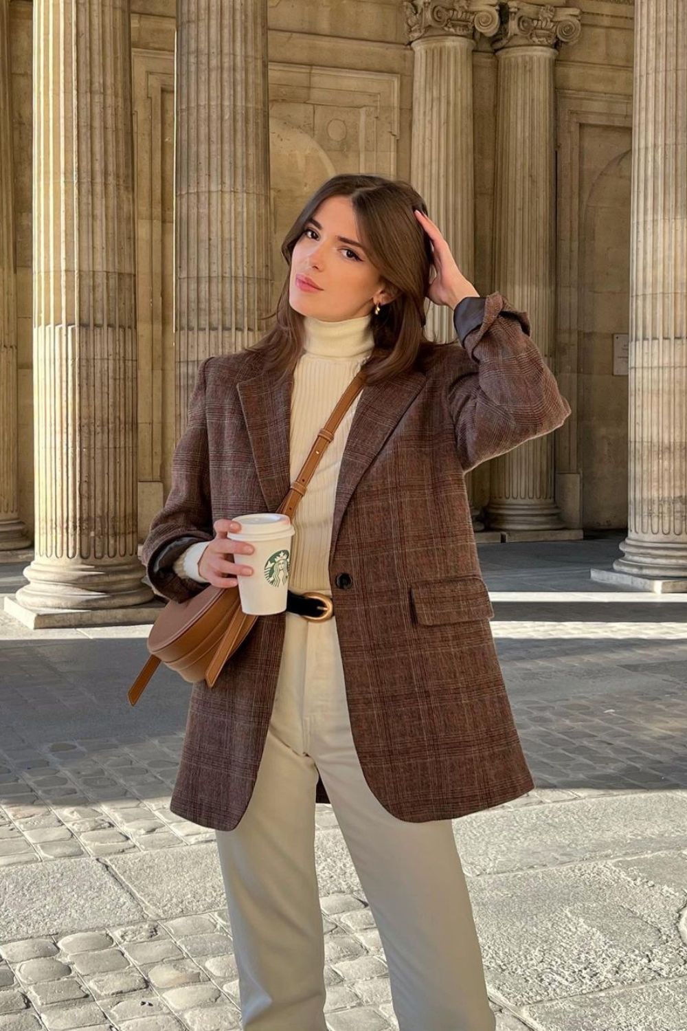 Brown plaid blazer with cream turtleneck and pants