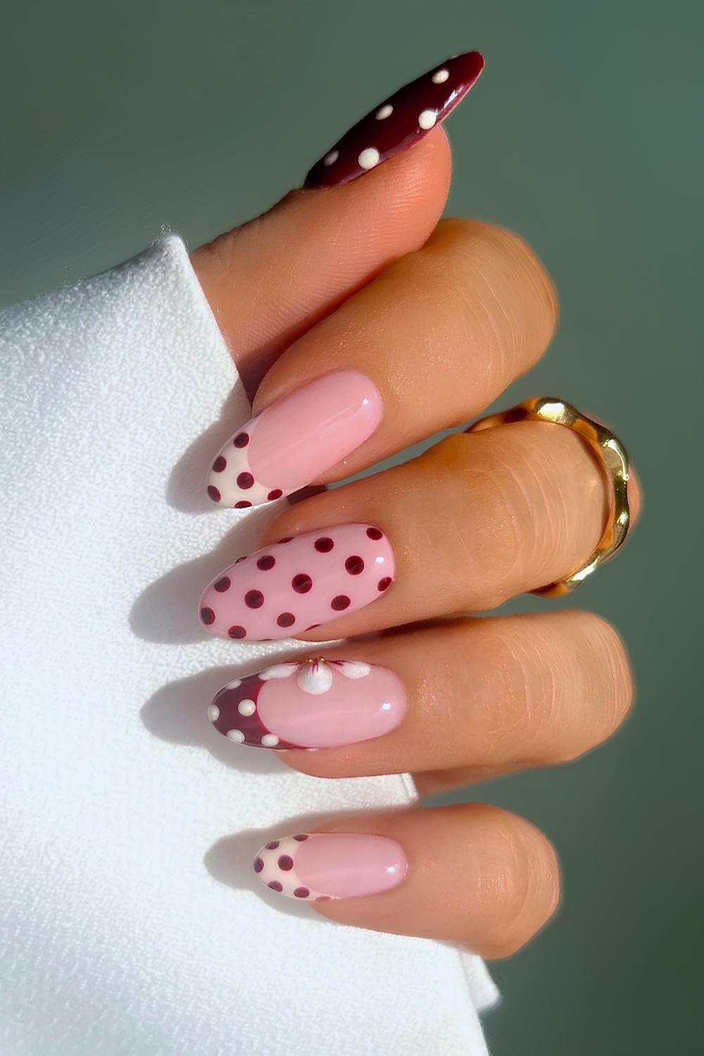 Burgundy and beige nails with polka dots