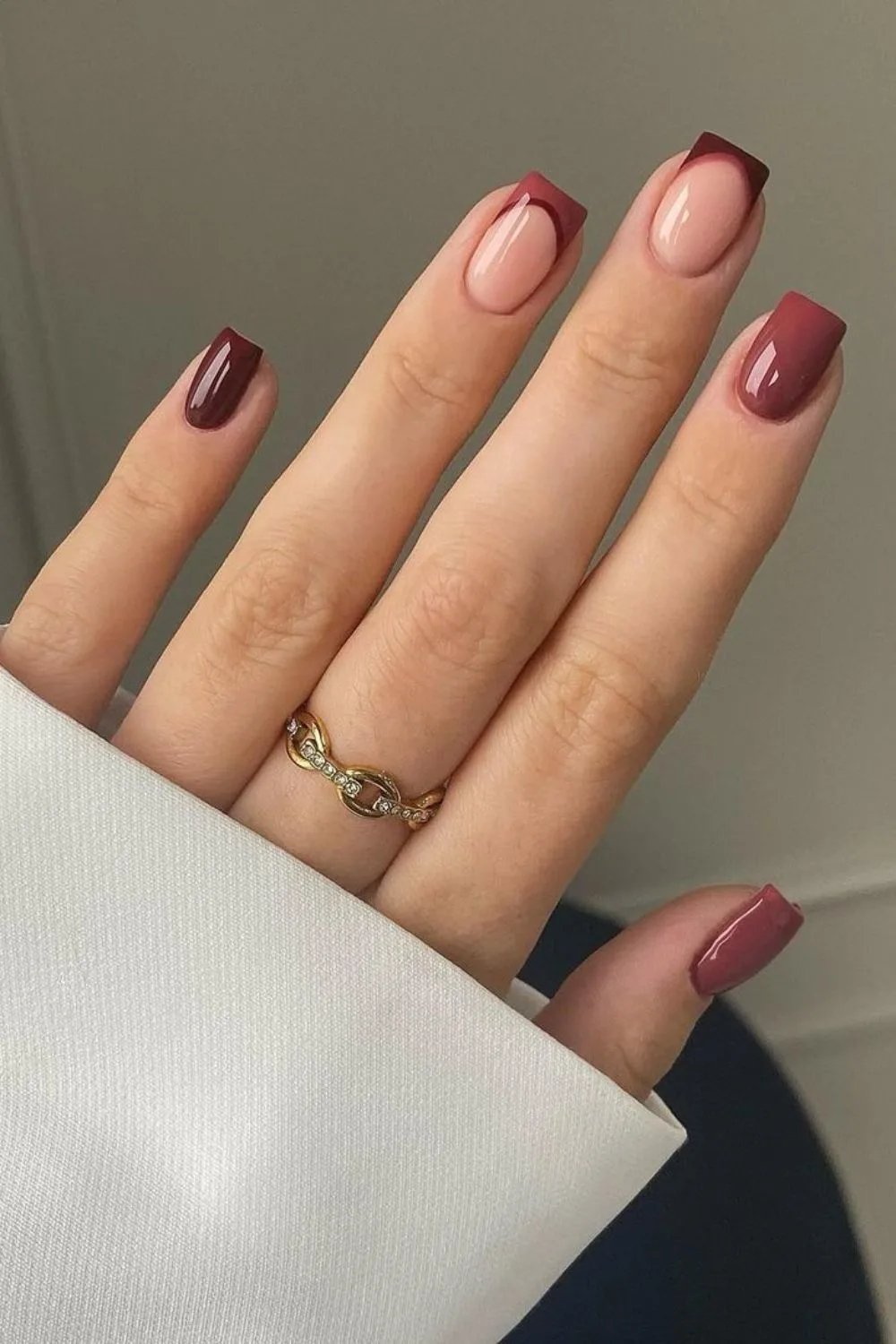 Burgundy and muted rose nails with french tip nail accents