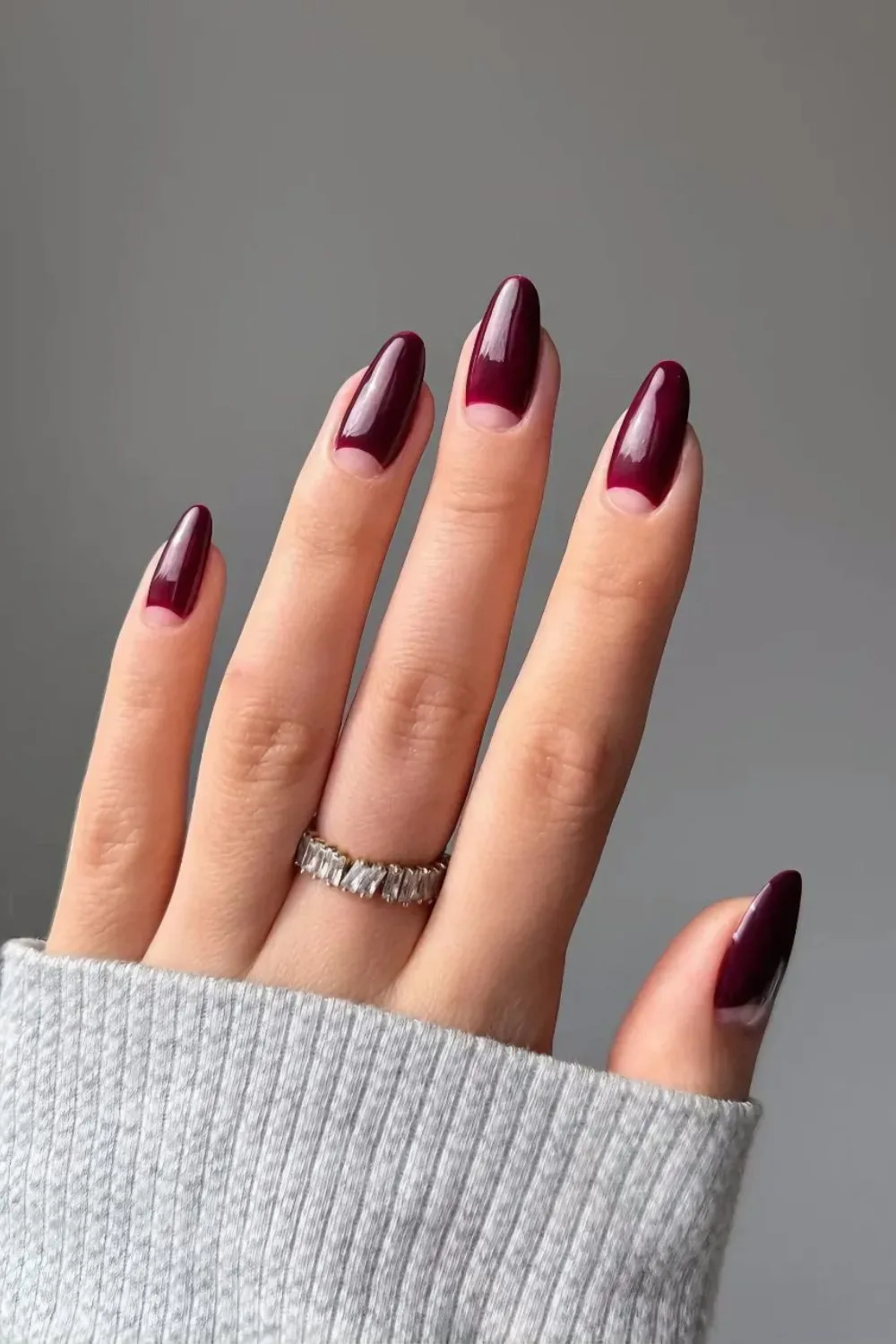 Burgundy half moon nail design