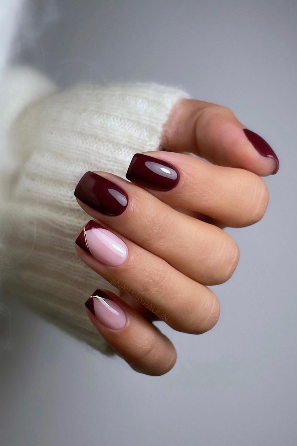 Burgundy mani with pointed french tip accents