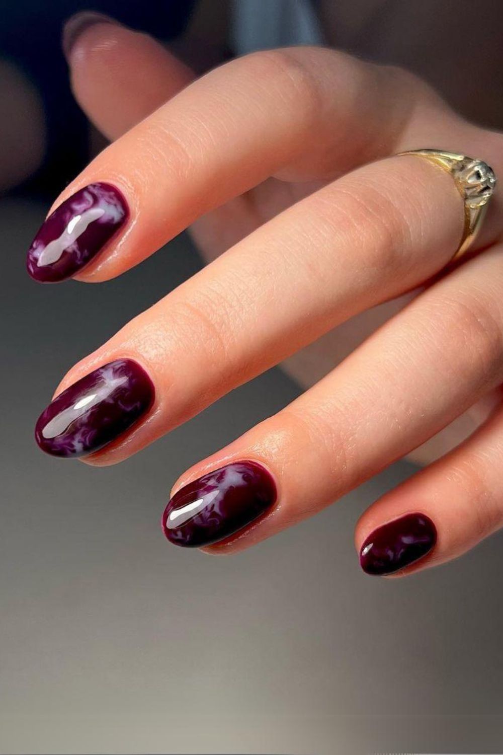 Burgundy nails with marble effect