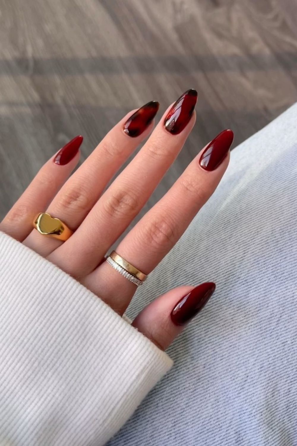 Burgundy tortie shell design manicure