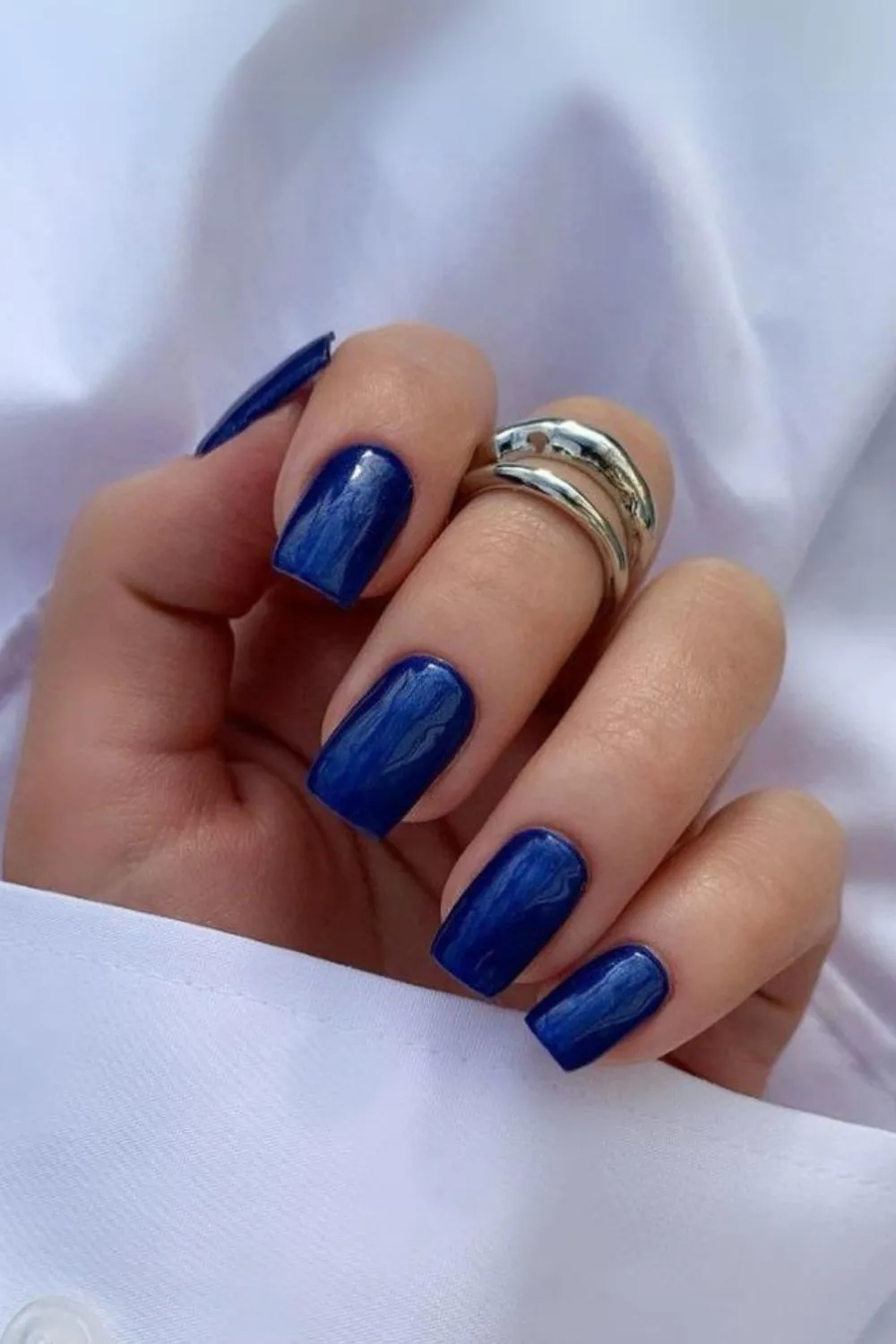 Dark blue chrome nails