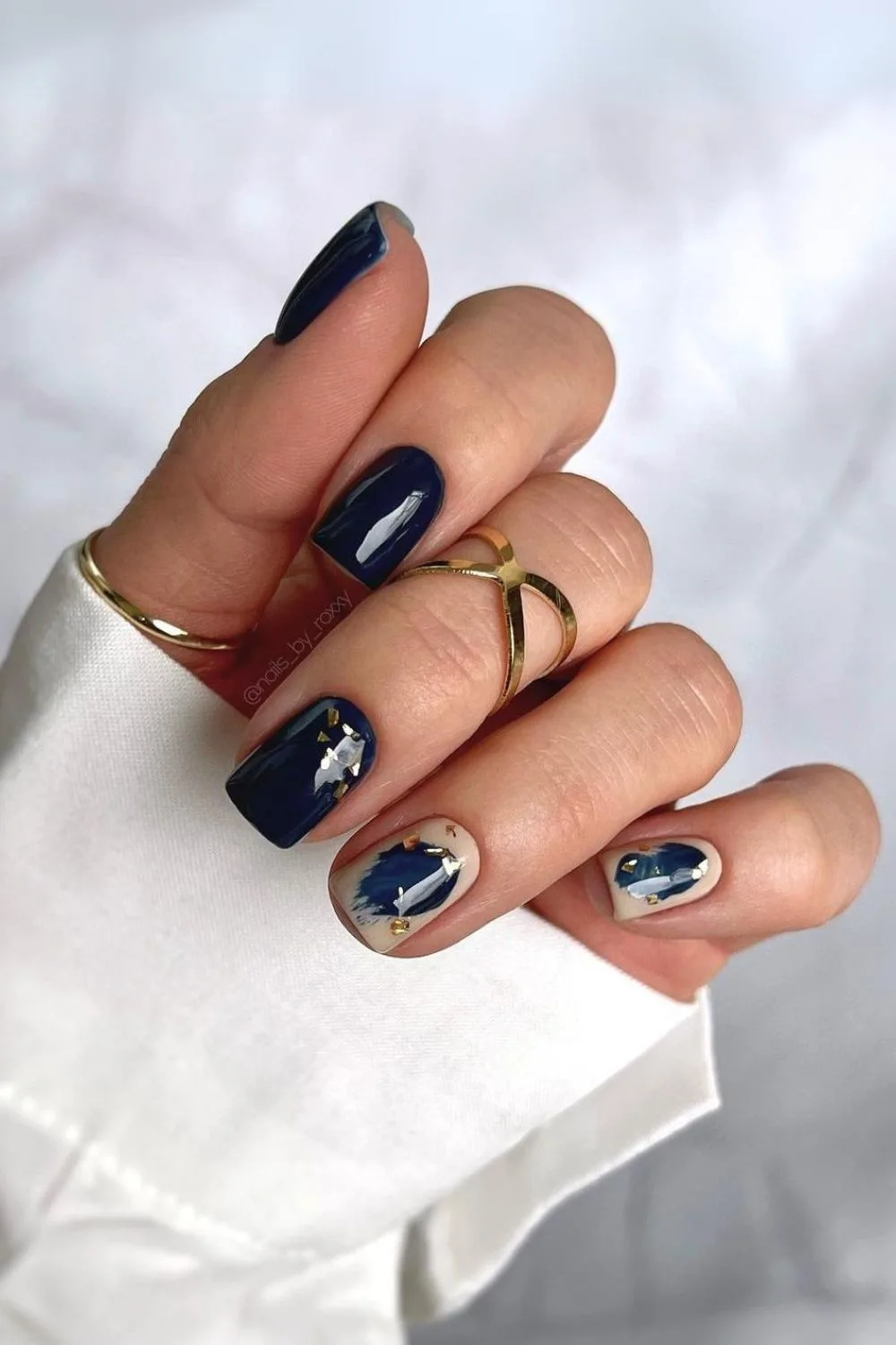 Dark blue fall nails with abstract design