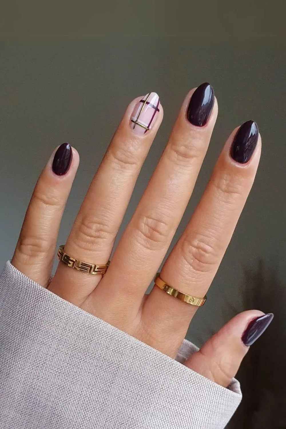 Dark purple nails with plaid design