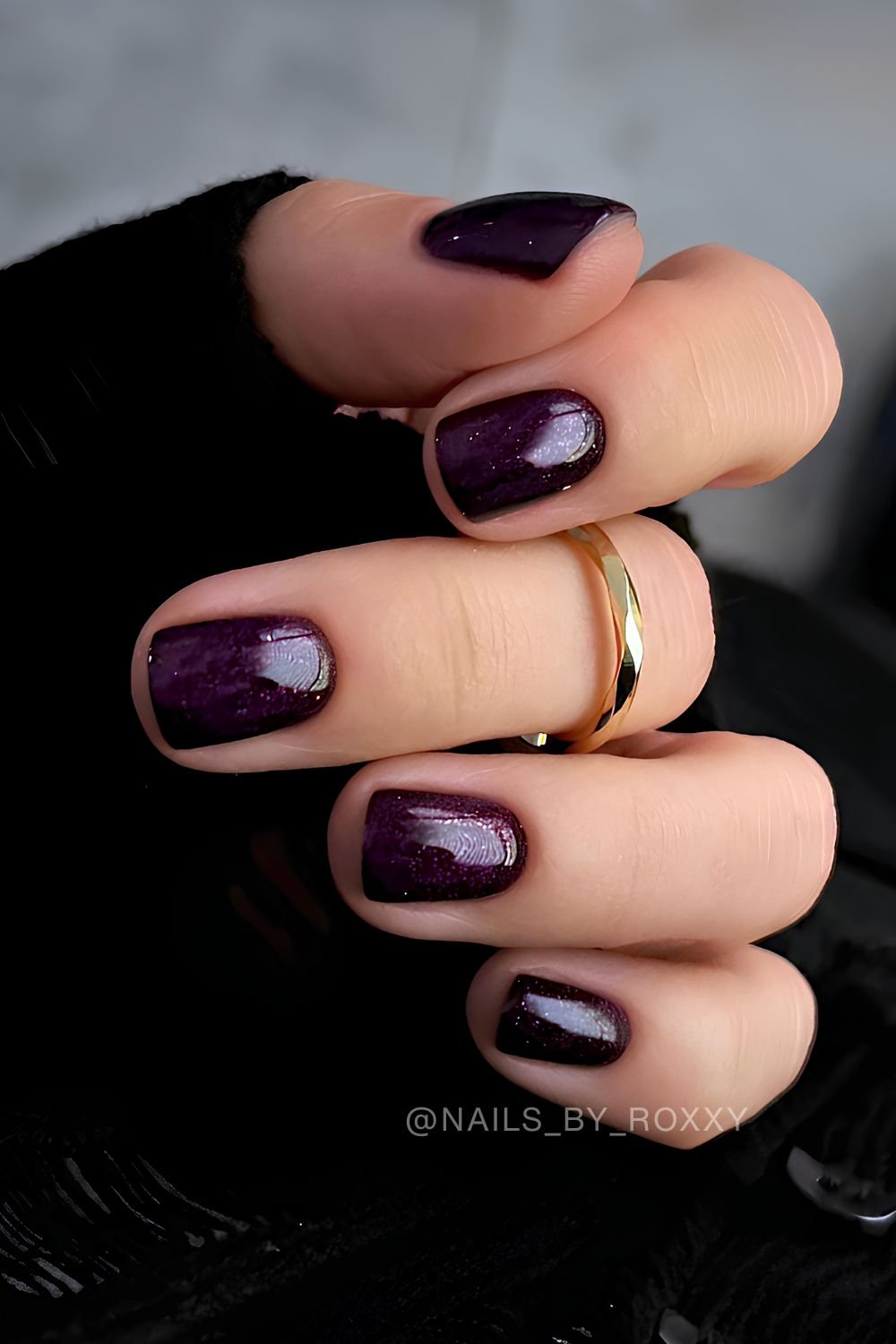Dark purple nails with shimmer