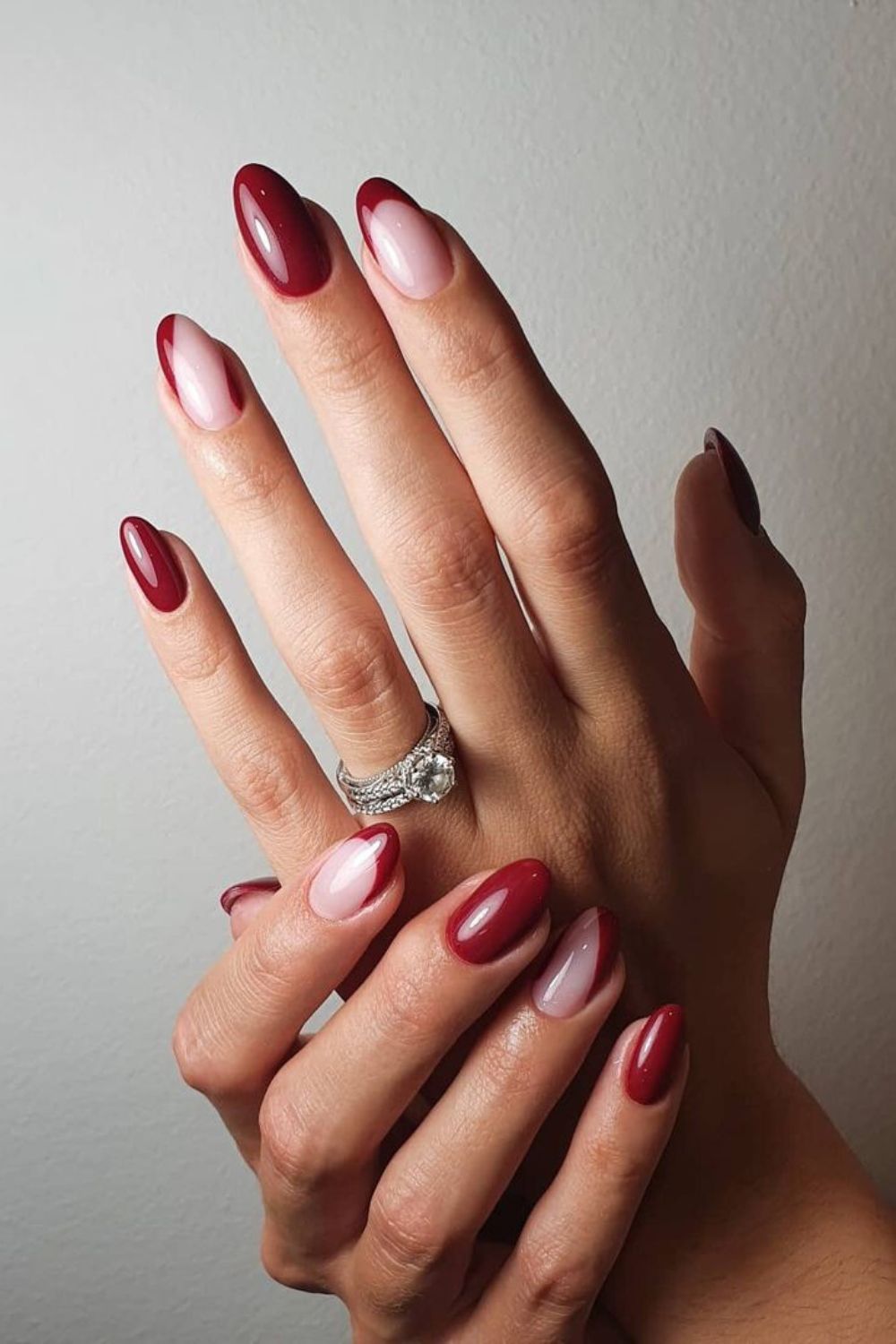 Dark red nails with negative space accent