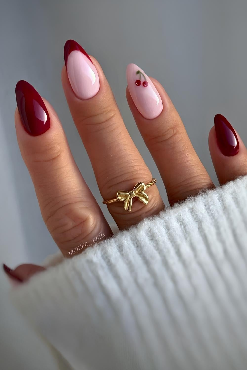 Dark red nails with tiny cherry art