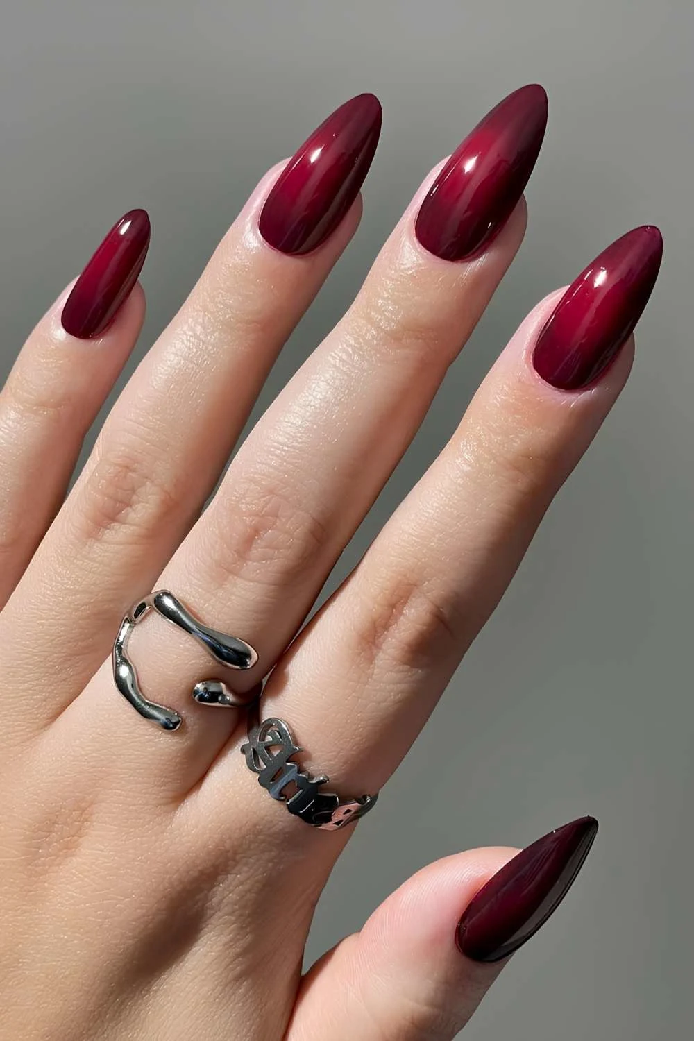 Deep red aura manicure