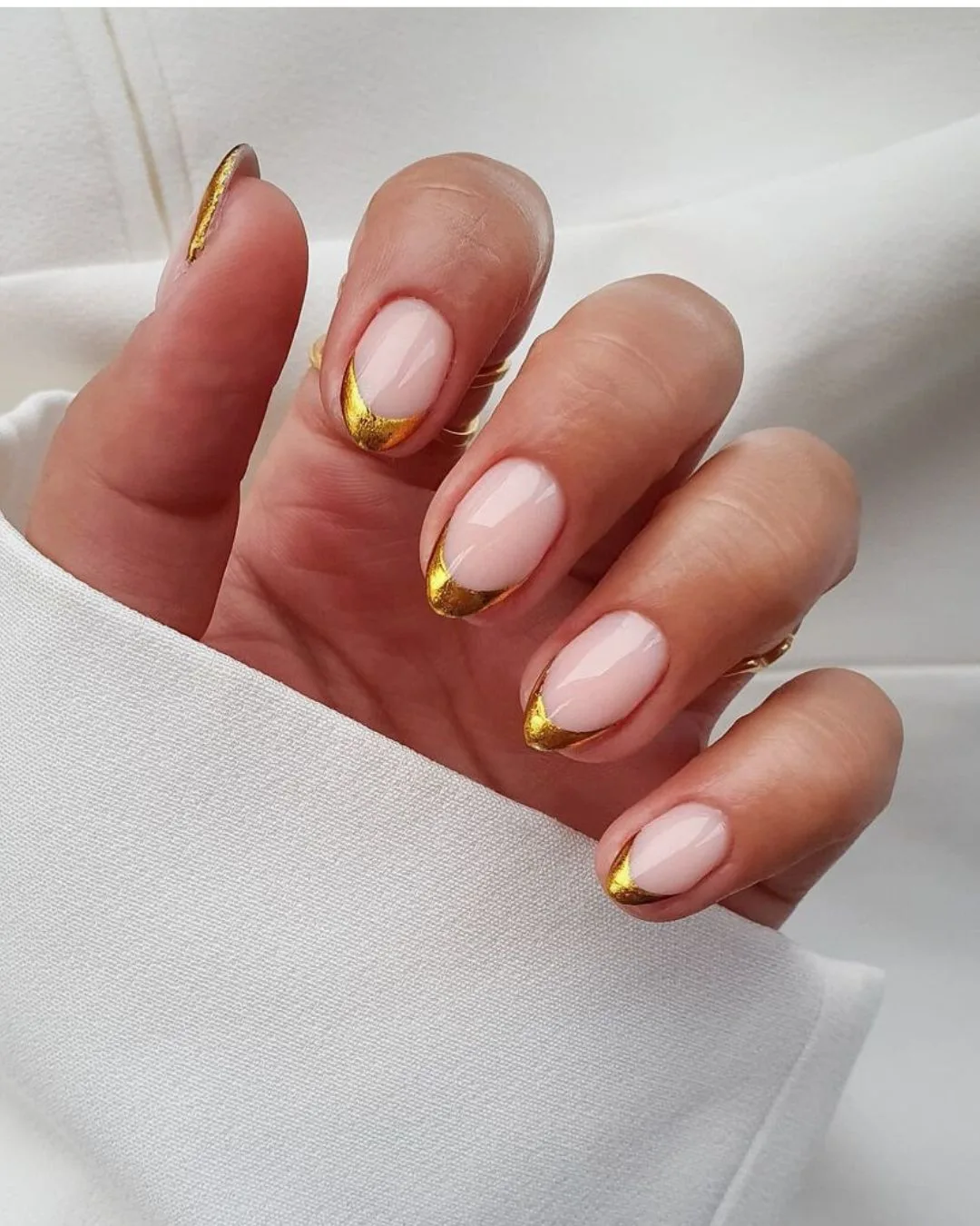 Elegant gold french tip nails