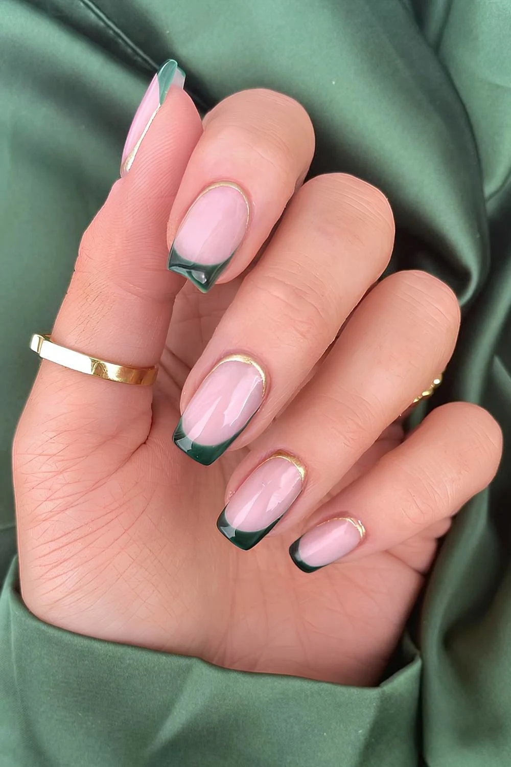 Emerald green French nails with gold details