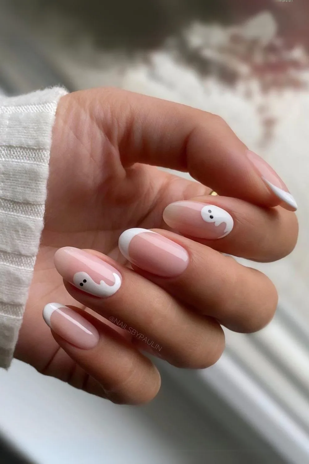 French nails with white ghost design