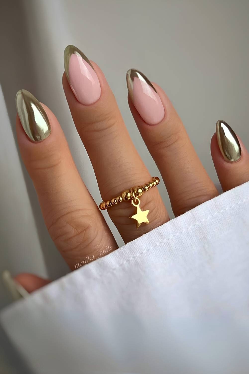 Gold chrome mani with accent French tips