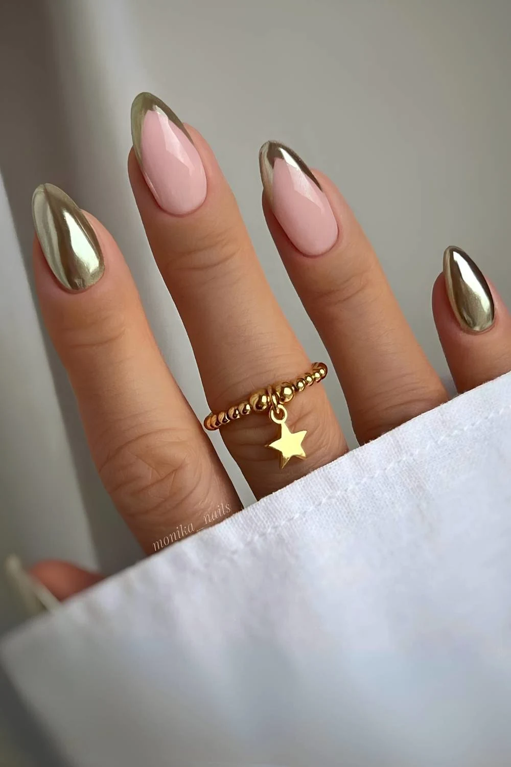 Gold chrome mani with accent French tips