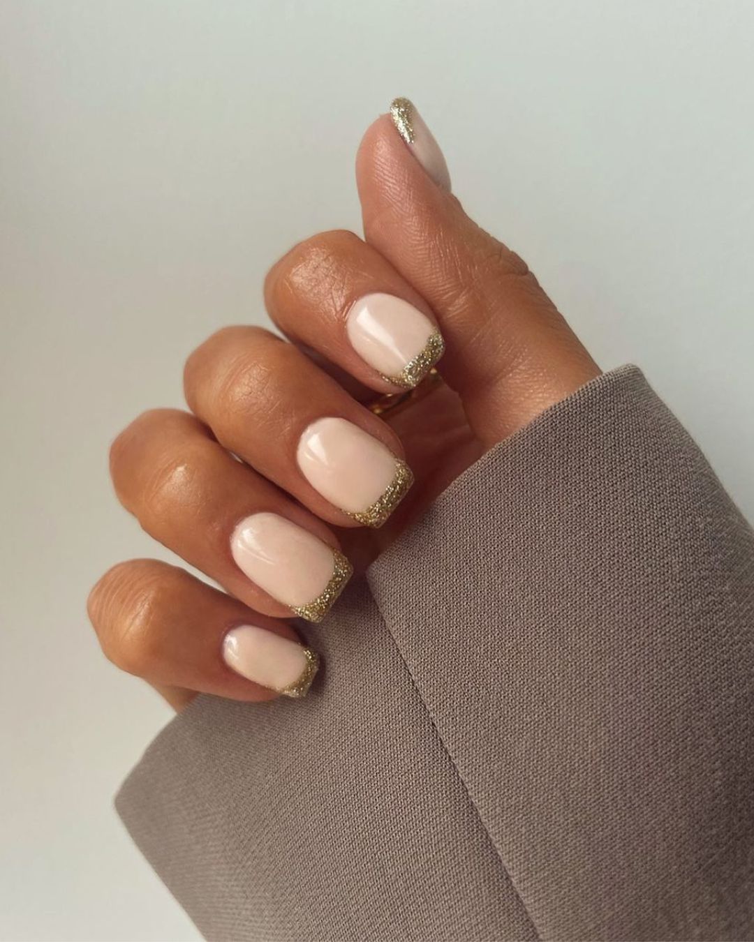 Gold glitter french tip mani