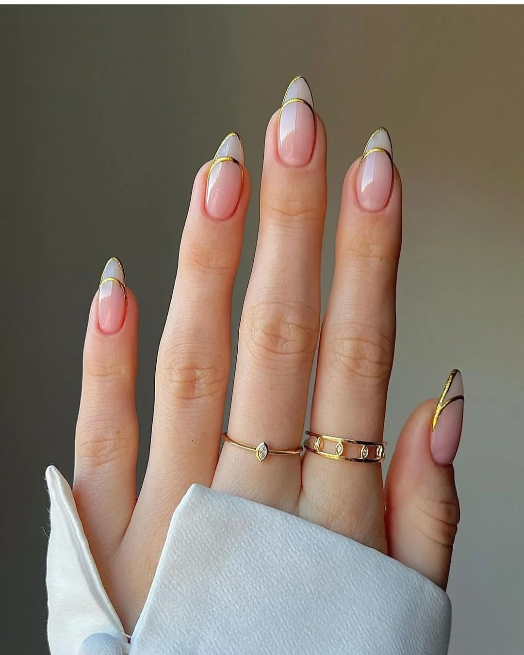 Gold outline french tip manicure