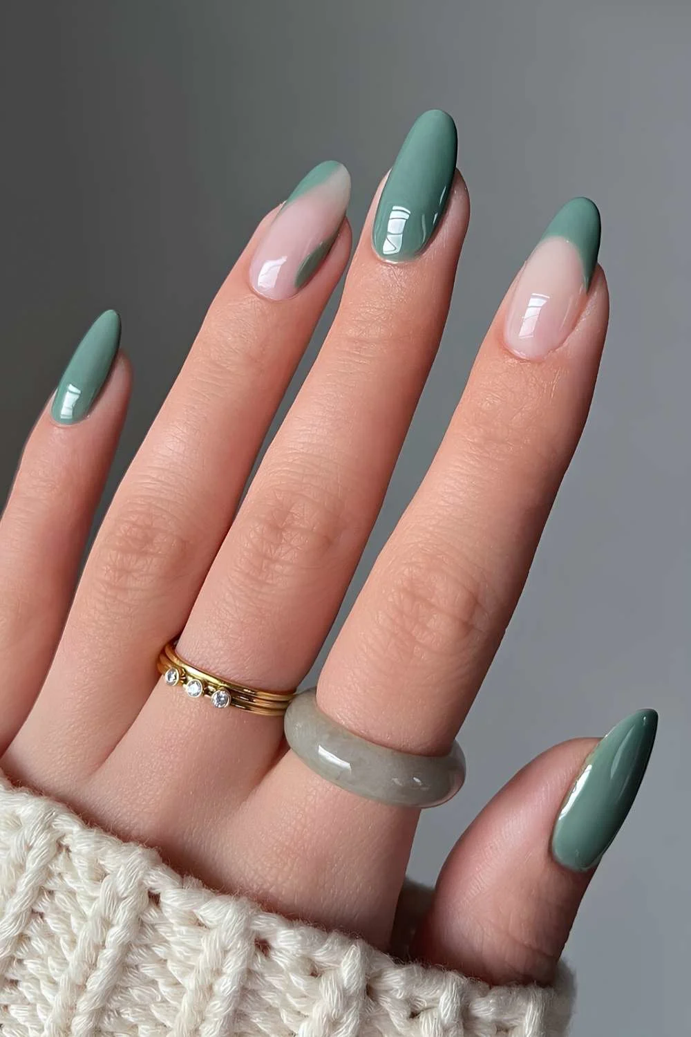 Green almond nails with negative space design