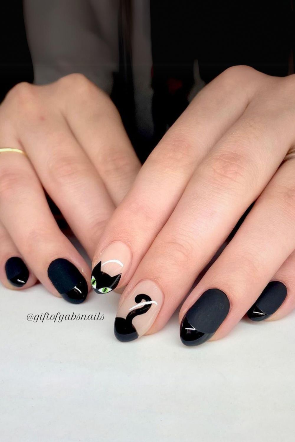 Halloween nails with black cat design