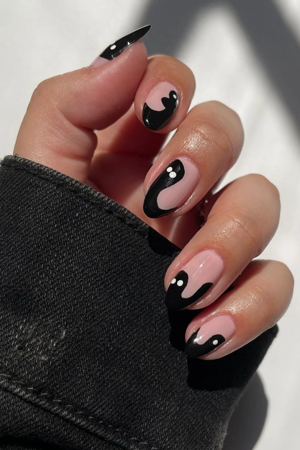 Halloween nails with black ghost design