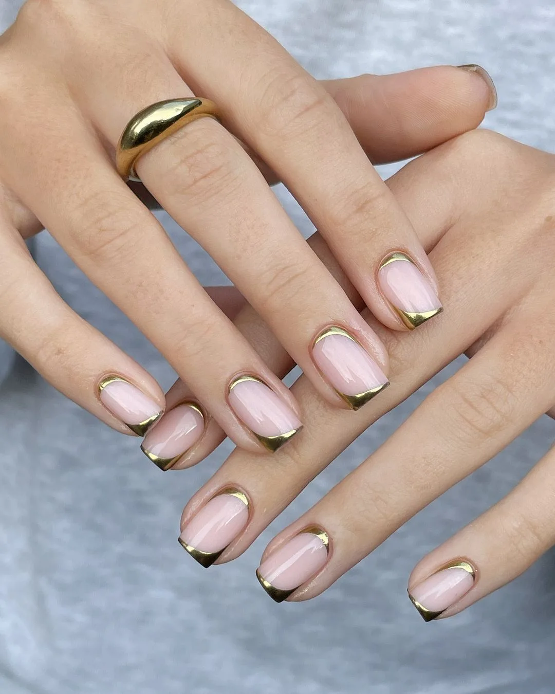 Inverted gold french mani