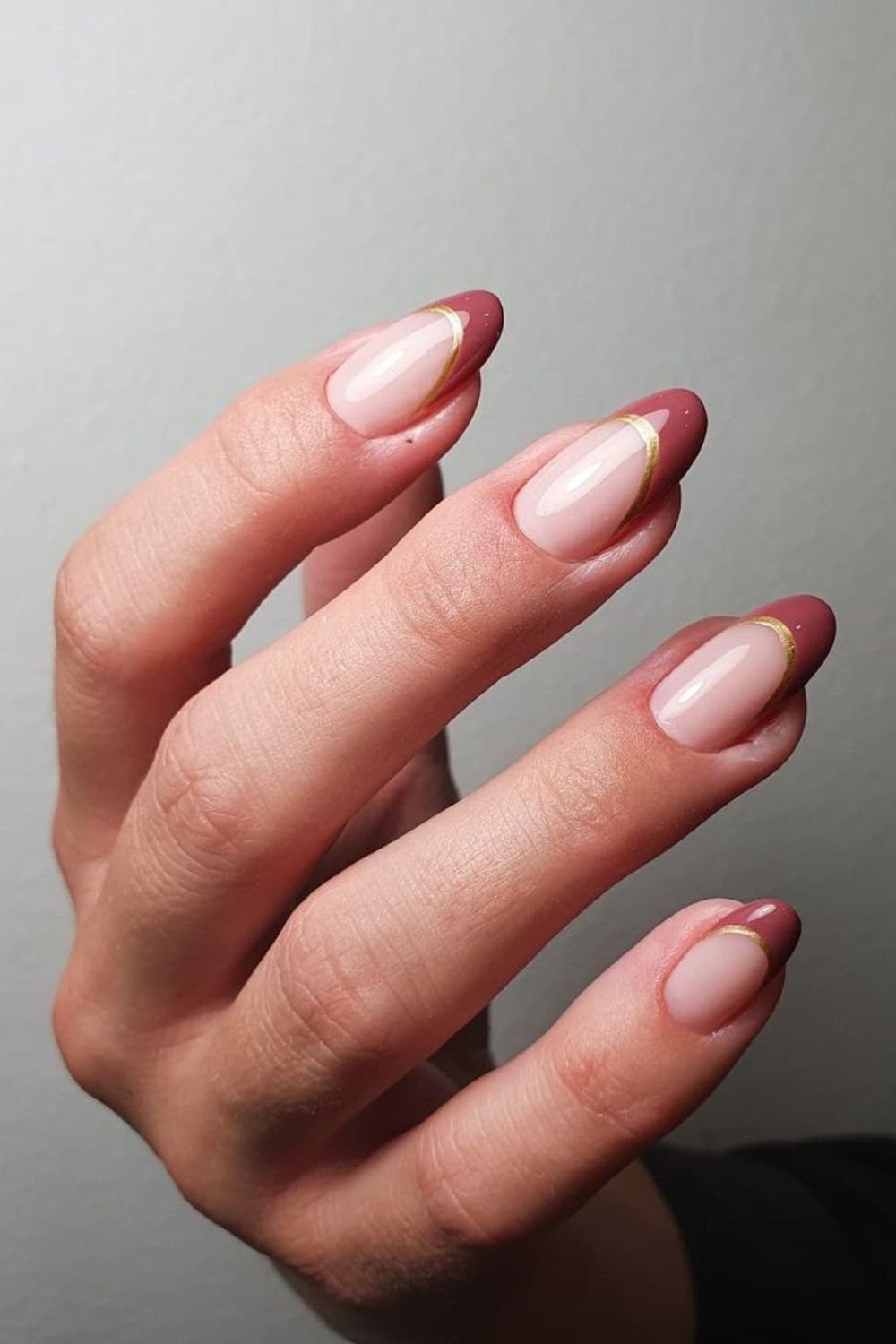 Mauve French nails with gold outline