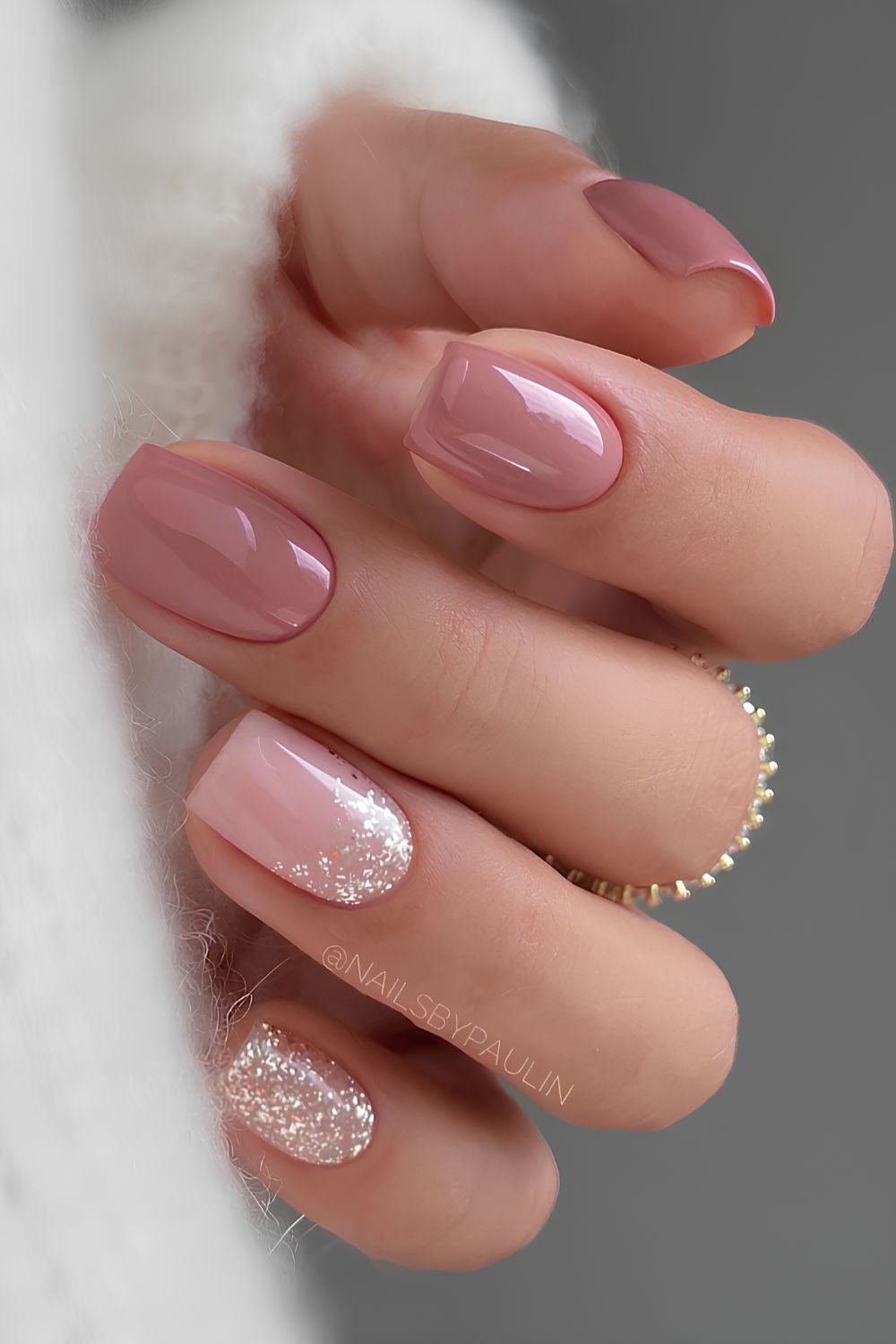 Mauve pink nails with glitter accent
