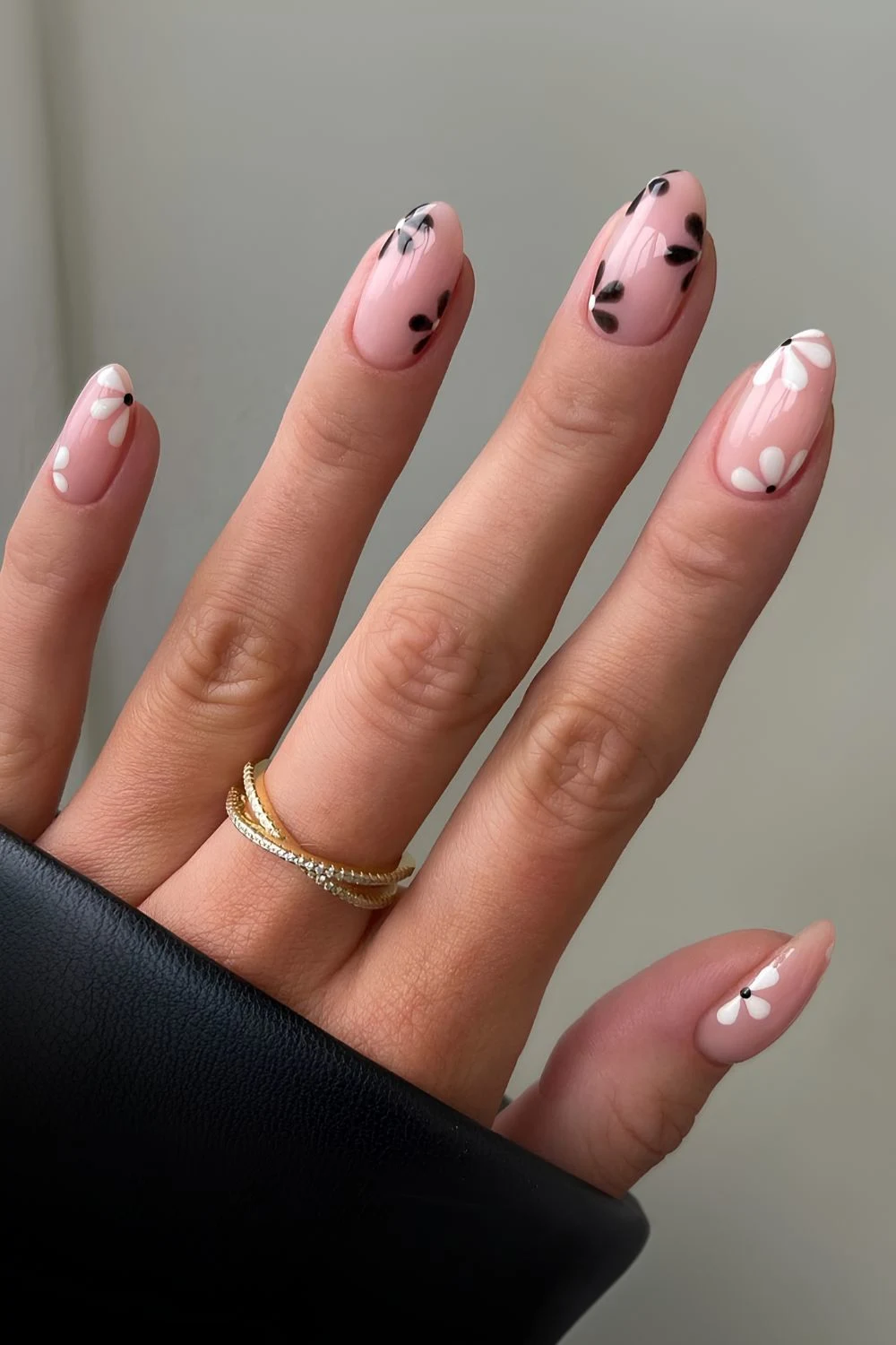 Milky nails with black and white flowers