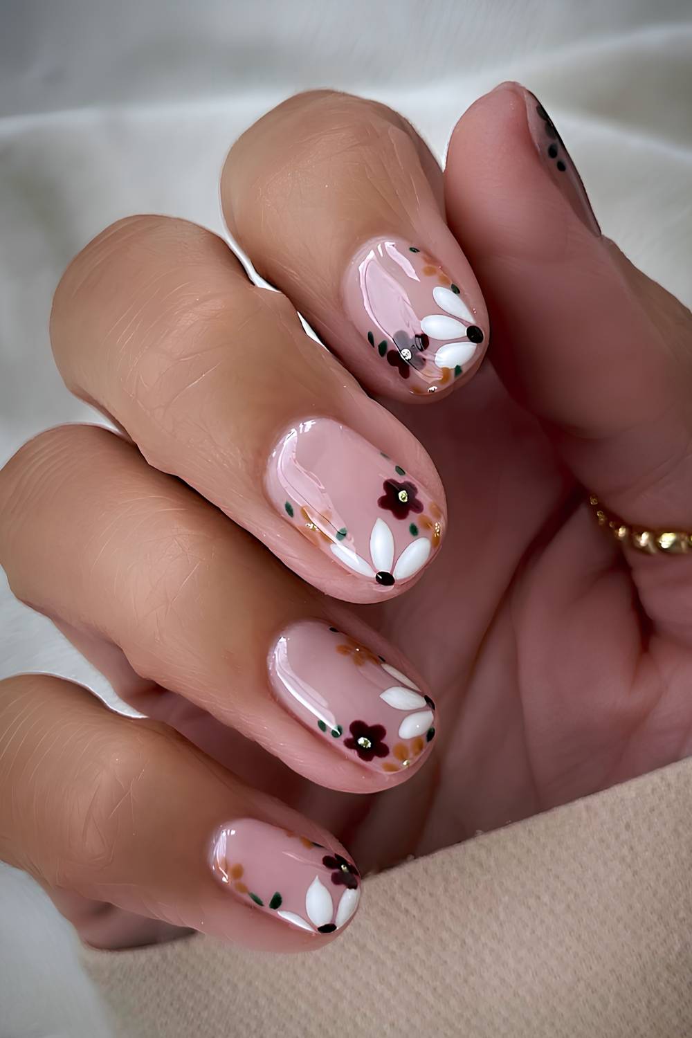 Milky nails with floral art in fall colors