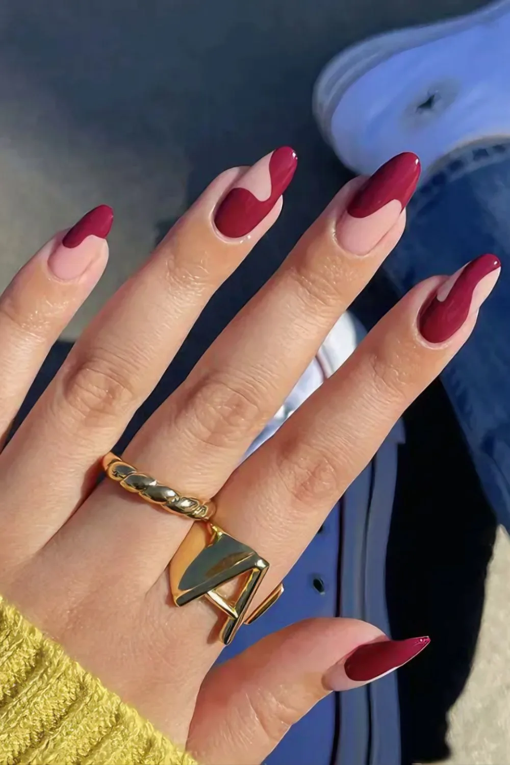 Nails with funky burgundy swirls