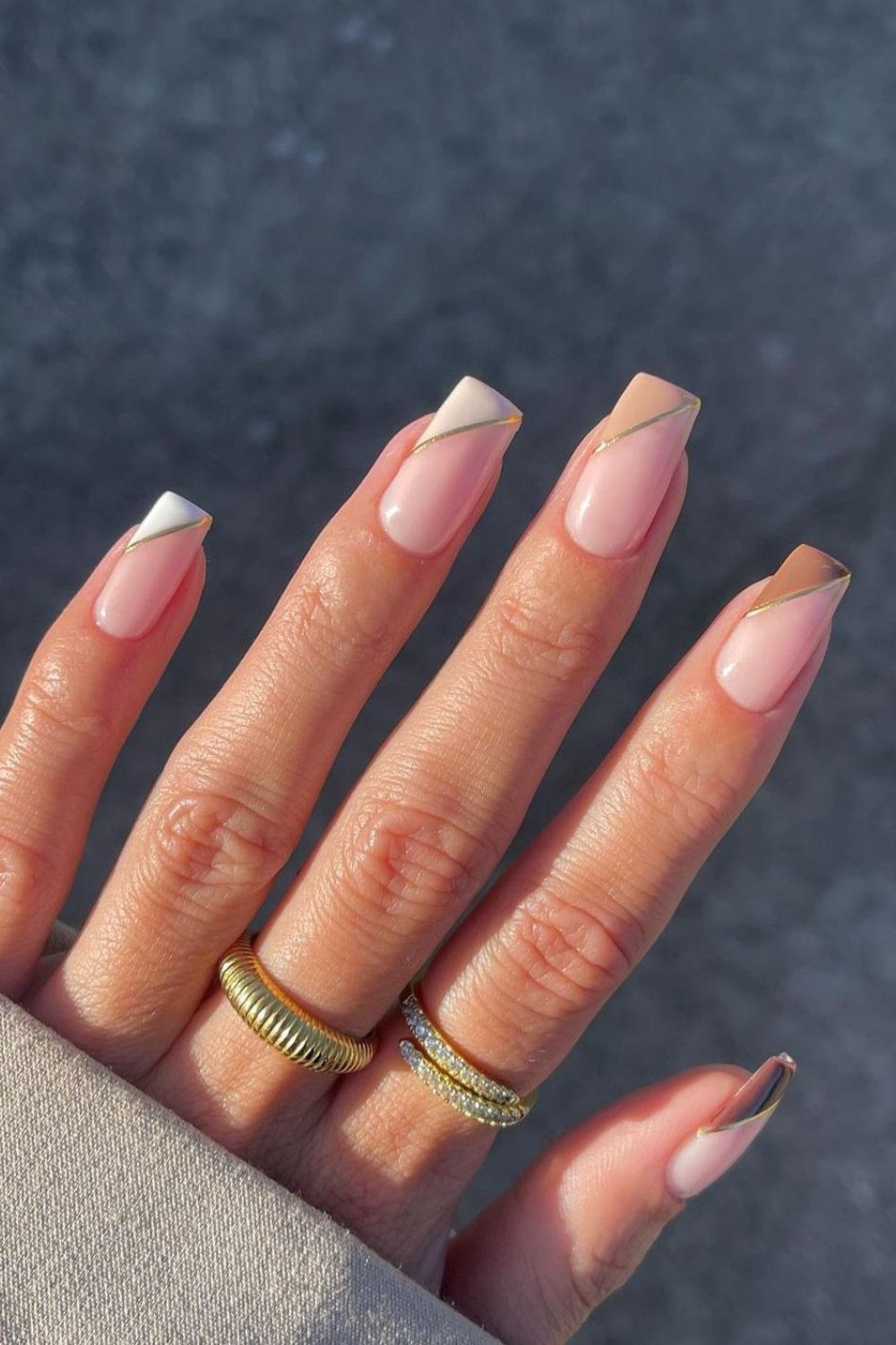 Nails with side french tips in neutral fall colors