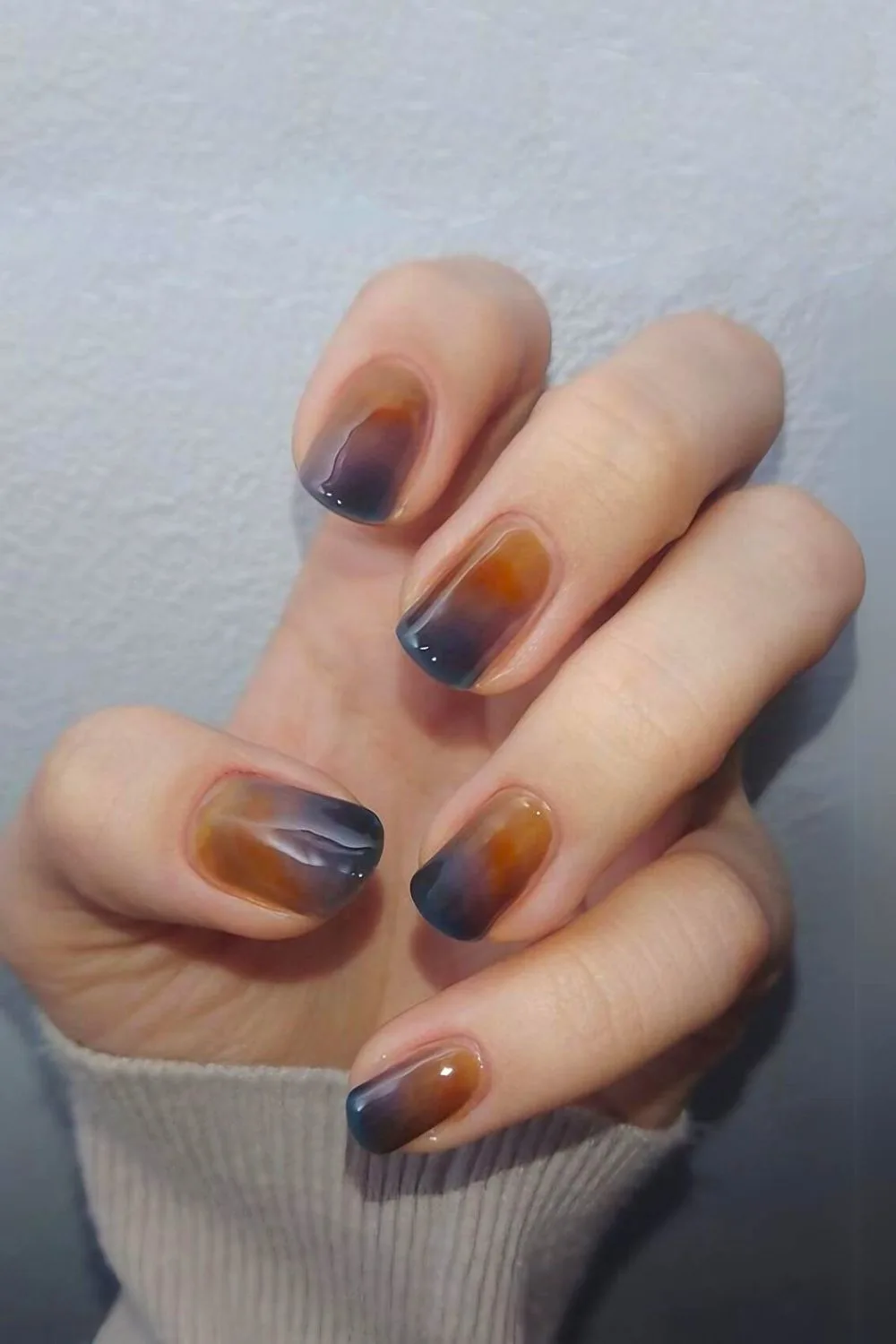 Navy and amber nails with smoky quartz agate effect