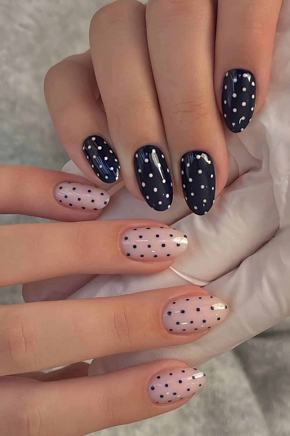 Navy and white polka dot manicure