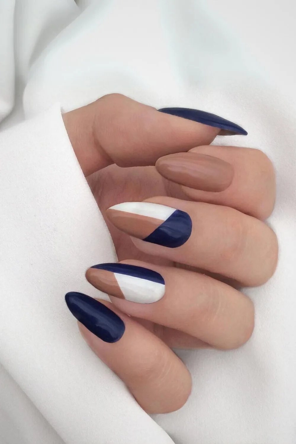 Navy blue and caramrl brown nail design