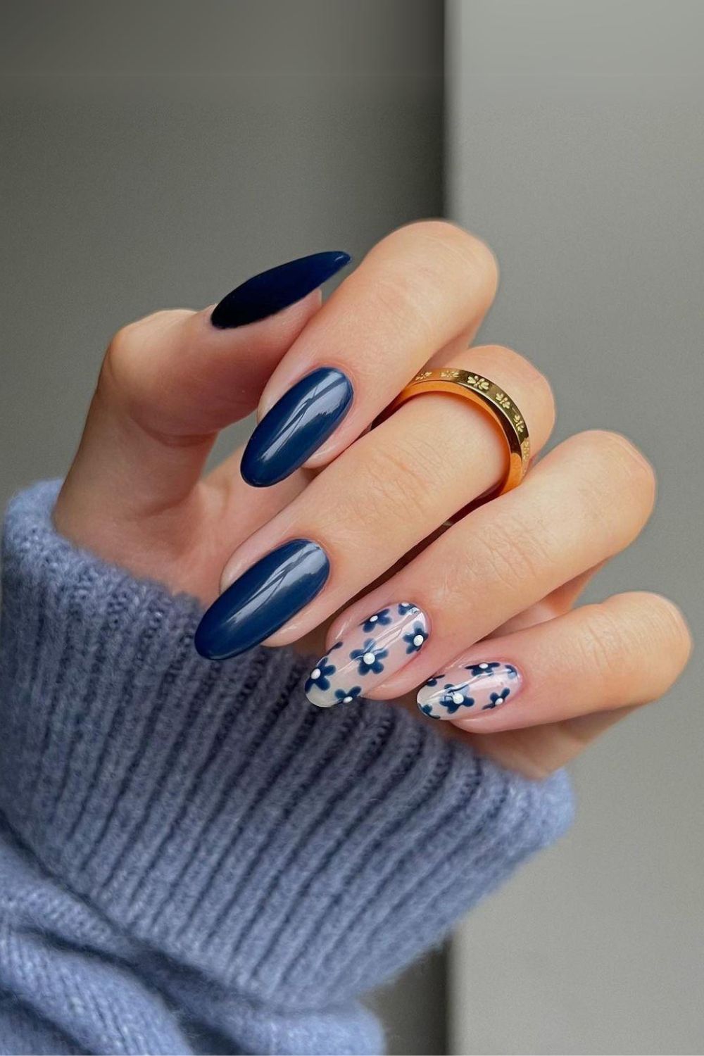 Navy blue nails with floral designs